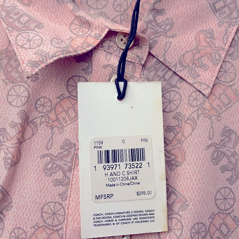 Woman’s coach button up shirt